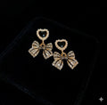 Elegant Black Heart and Bow Earrings